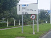 Sign pointing to Stillorgan business park and motorway
