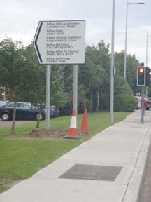 Large white roadside sign in Dublin